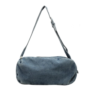 Japanese style denim cylinder crossbody bag in washed blue with adjustable strap