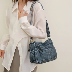 Sac bandoulière classique en cuir lavé bleu foncé pour femme avec finitions en bronze