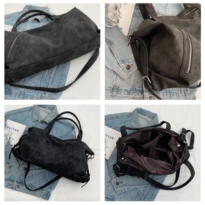 Detailed views of charcoal tote bag showing interior lining and large capacity pockets