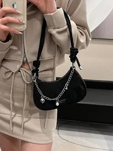 Retro black velvet crescent shoulder bag with heart pearl chain and knotted strap detail