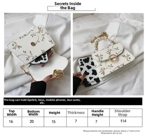 Size chart for lace embroidery handbag showing dimensions and internal storage capacity