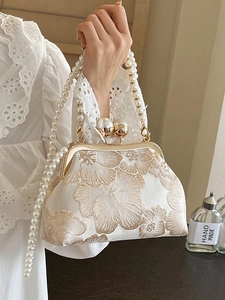 Elegant Chinese style pearl embroidered handbag with golden frame and beaded shoulder strap