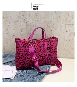 Detail of rose red leopard print tote bag with adjustable strap and quilted texture