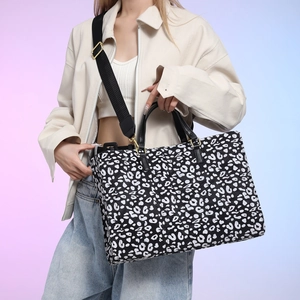 Large capacity leopard print tote bag with black leather handles and crossbody strap