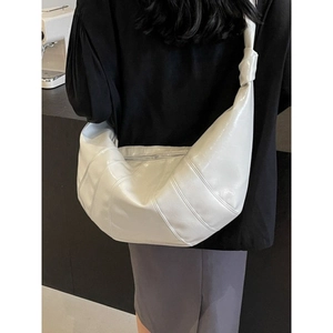 Minimalist white glossy half-moon crossbody bag with wide knot shoulder strap for women