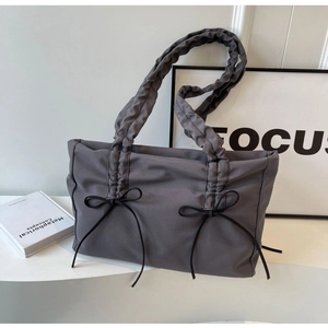 Dark grey pleated shoulder tote bag with decorative black ribbon bows in Korean style