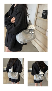 Silver pleated large capacity hobo bag with metal chain strap and cloud pendant detail