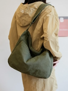 Olive green nylon messenger bag with large capacity for casual streetwear style