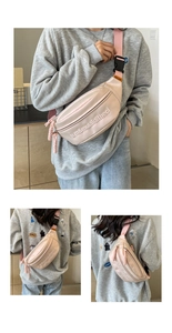 Dettaglio del borsello rosa alla moda con ricamo e tracolla in nylon regolabile
