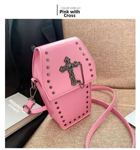 Pink coffin-shaped crossbody bag with vintage cross relief and silver rivet details