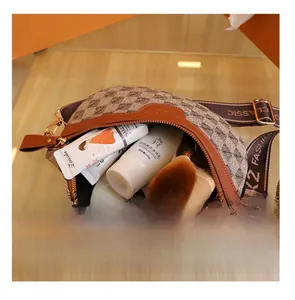 Detail presentation showing the spacious interior of a retro jacquard chest bag for women