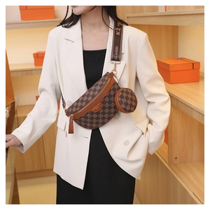 Detail of checkered crossbody bag with round coin purse and stylish fabric strap