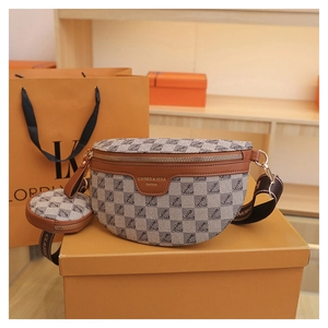 Detail view of monogram canvas crescent bag with detachable round coin purse and woven strap