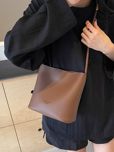 Chic brown lychee pattern leather bucket bag for women with fashion embossing