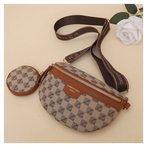 Detailed macro view of monogram canvas waist bag with small round coin purse attachment