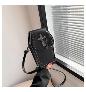Gothic coffin-shaped crossbody bag featuring silver rivets and a vintage metal cross detail