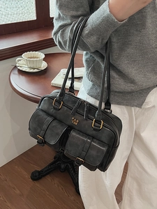 Vintage black faux leather bowling tote bag with double front flap pockets and gold hardware