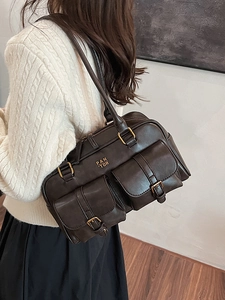 Brown vintage faux leather tote bag with gold hardware and two front pockets