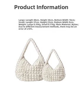 Size chart for white quilted nylon tote bags showing large and small dimensions