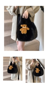 Detailed macro view of black faux fur tote bag with a small brown plush bear charm accessory
