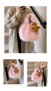 Detail showing soft pink faux fur texture and a cute brown teddy bear charm with pearls