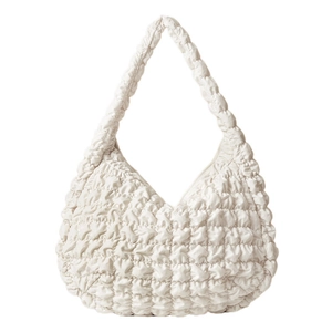 Minimalist creamy white quilted hobo bag featuring a cloud-like pleated texture design