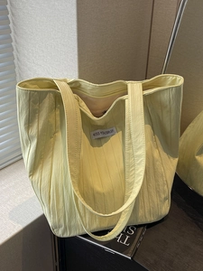 Pleated large capacity canvas tote bag in light green with stylish shoulder straps for women