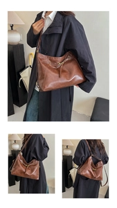 Close-up of minimalist brown tote bag with metallic rings and leather drawstring detail