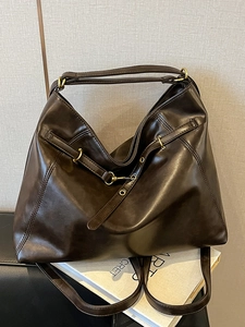 Minimalist dark coffee leather tote bag with vintage gold hardware for women
