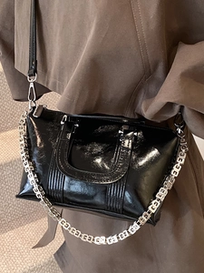 Classic black glossy chain handbag with silver metal links and leather strap for women