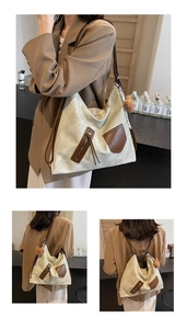 Detail of beige canvas tote with brown leather pockets and convertible strap options