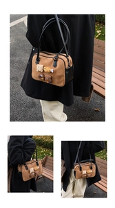 Detail of vintage brown suede shoulder bag with cute cookie and donut patches
