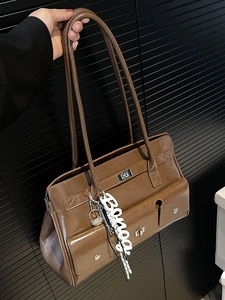 Vintage dark brown oil wax leather messenger tote bag with multiple pockets and metal buckles