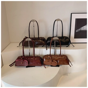 Collection of vintage oil wax texture baguette bags in dark coffee, black, wine, and tan
