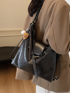 Large black PU leather tote backpack for women with baseball charms and adjustable straps