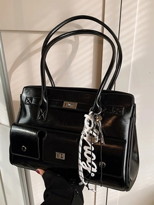 Vintage black faux leather briefcase tote bag with multiple pockets and silver locks