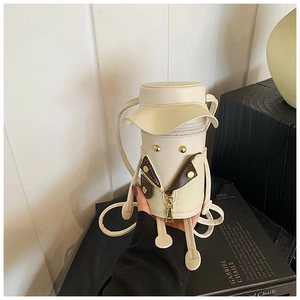 Detailed macro view of beige cylinder crossbody bag with jacket-style collar and metal studs