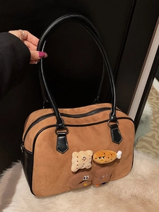 Retro brown suede Boston bag with cute plush charms and black leather handles