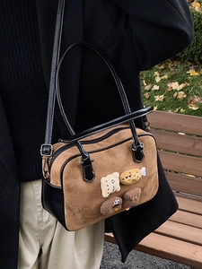 Vintage brown suede pillow bag with cartoon charms and black leather straps for women