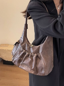 Retro brown pleated underarm bag in PU leather with vintage aesthetic for women