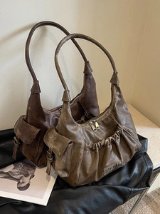 Retro aesthetic wrinkled leather shoulder bag in coffee and olive green colors