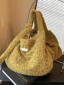 Mustard yellow faux fur tote bag with top handles and adjustable shoulder strap