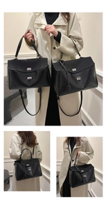 Detail of black matte leather handbag with silver twist lock and adjustable strap