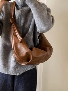 Brown vintage faux leather pleated hobo bag with knotted shoulder strap detail for women