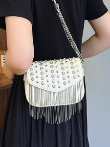 White faux leather crossbody bag with silver rhinestones and metal chain fringe