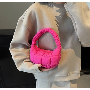 Fashionable rose pink quilted puffer handbag with stitch patterns for women's casual style