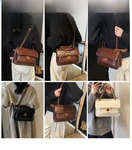 Quilted chain shoulder bag styles shown on model with metal twist lock detail