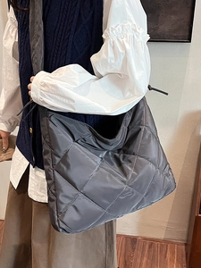 Minimalist grey quilted tote bag with padded rhombus pattern for women casual shoulder use