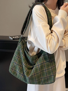 Checkered green wool hobo bag with large capacity and wide strap for casual commuting