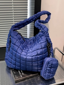 Royal blue quilted puffer bag with matching coin purse and wide ruched shoulder strap